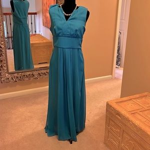 Antthony Studio sleeveless long dress in beautiful blue.